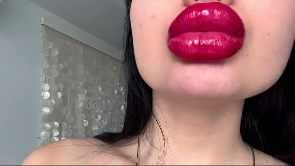 XXX bimbo playing with her big fake lips cool Movies